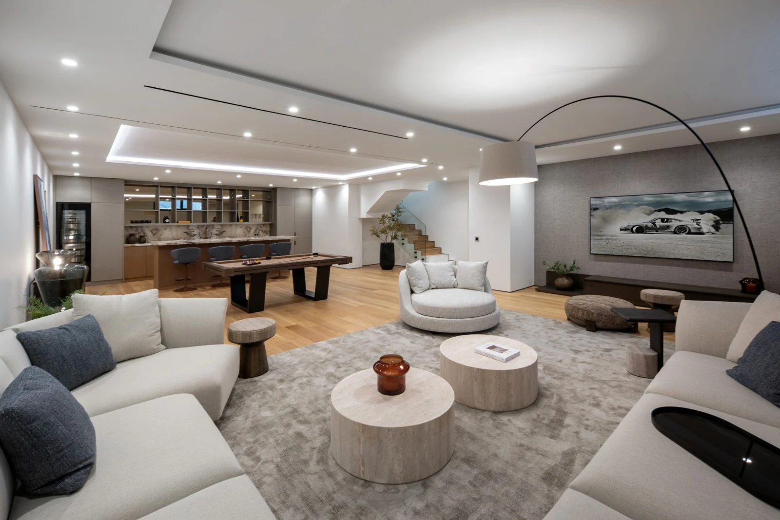 Lower-level lounge with seating and games area