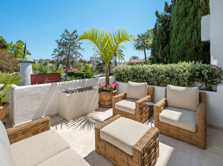 Terrace seating with mature planting on Marbella’s Golden Mile