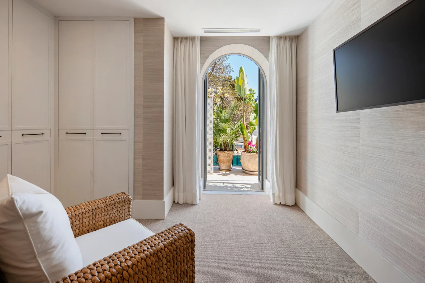 Bedroom opening onto terrace on Marbella’s Golden Mile