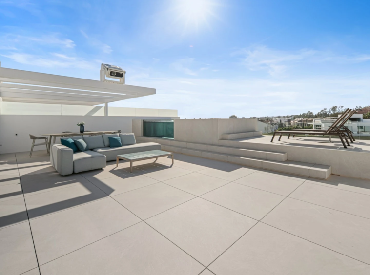 Spacious rooftop terrace with lounge seating