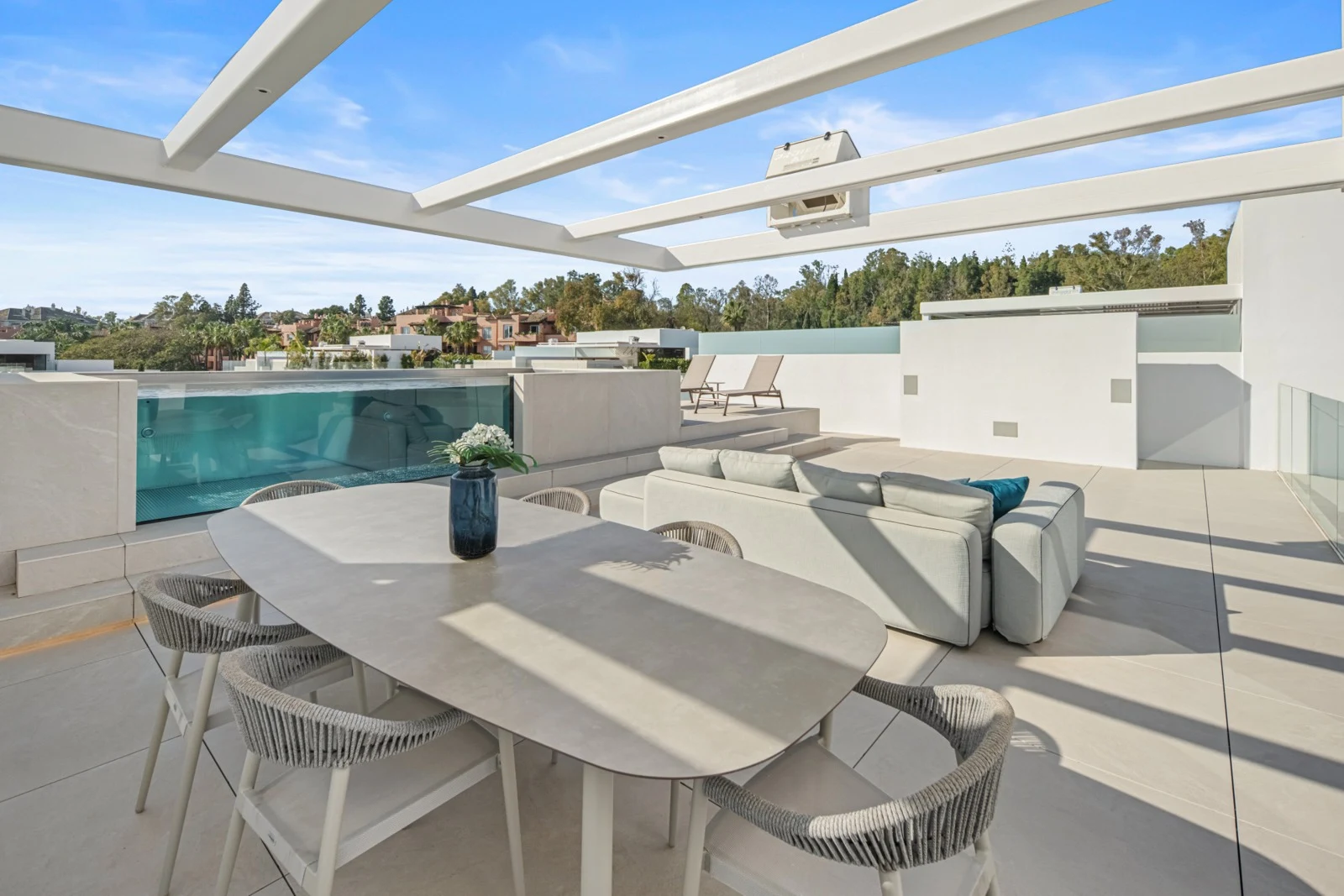 Rooftop pergola and seating beside the private pool