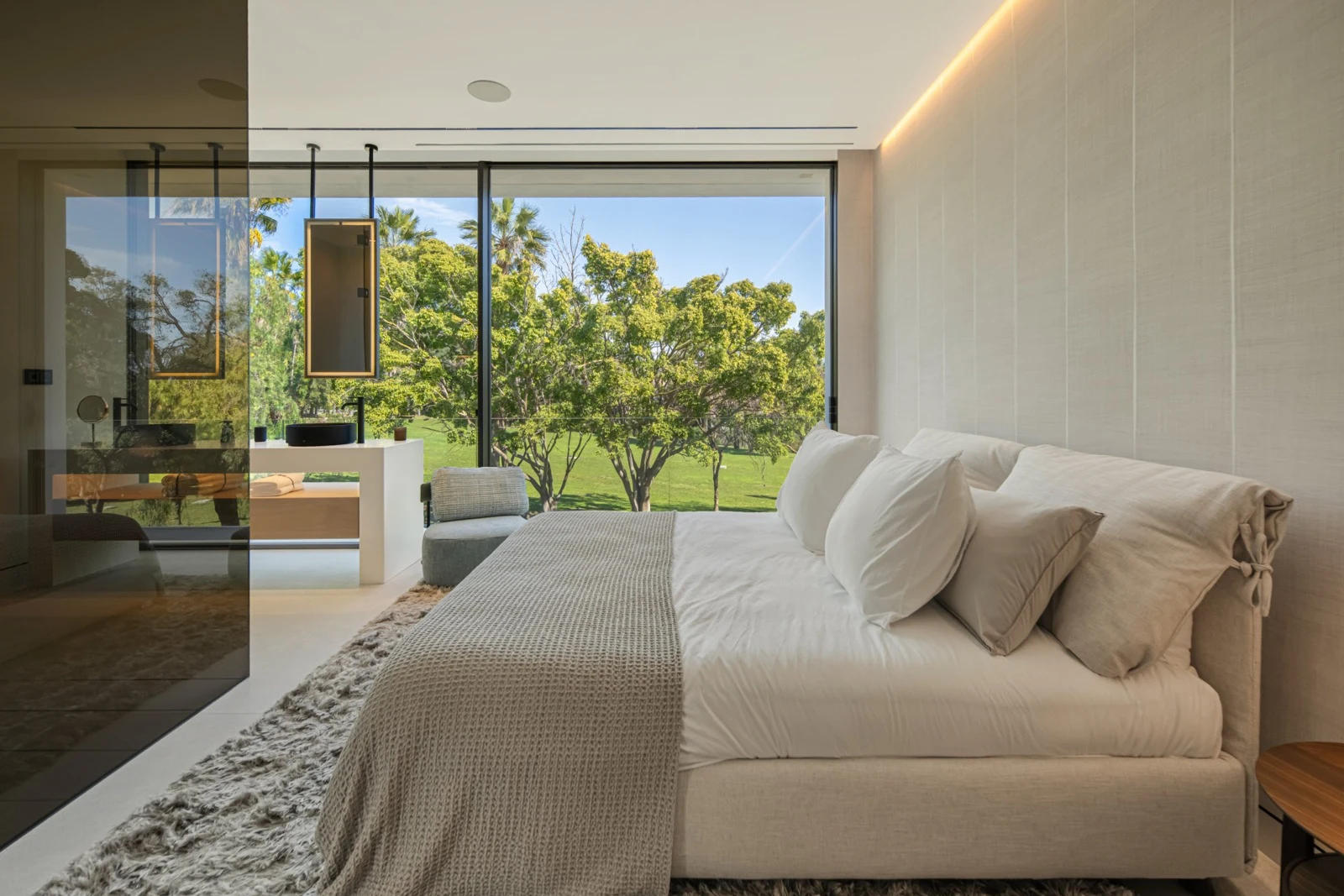 Guest bedroom with garden-facing glazing