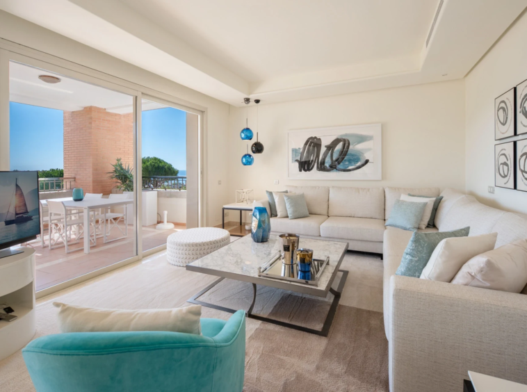 Bright living room opening onto the private terrace