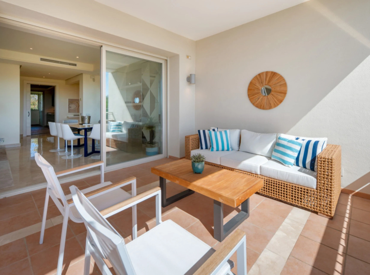 Sheltered terrace lounge beside the living room