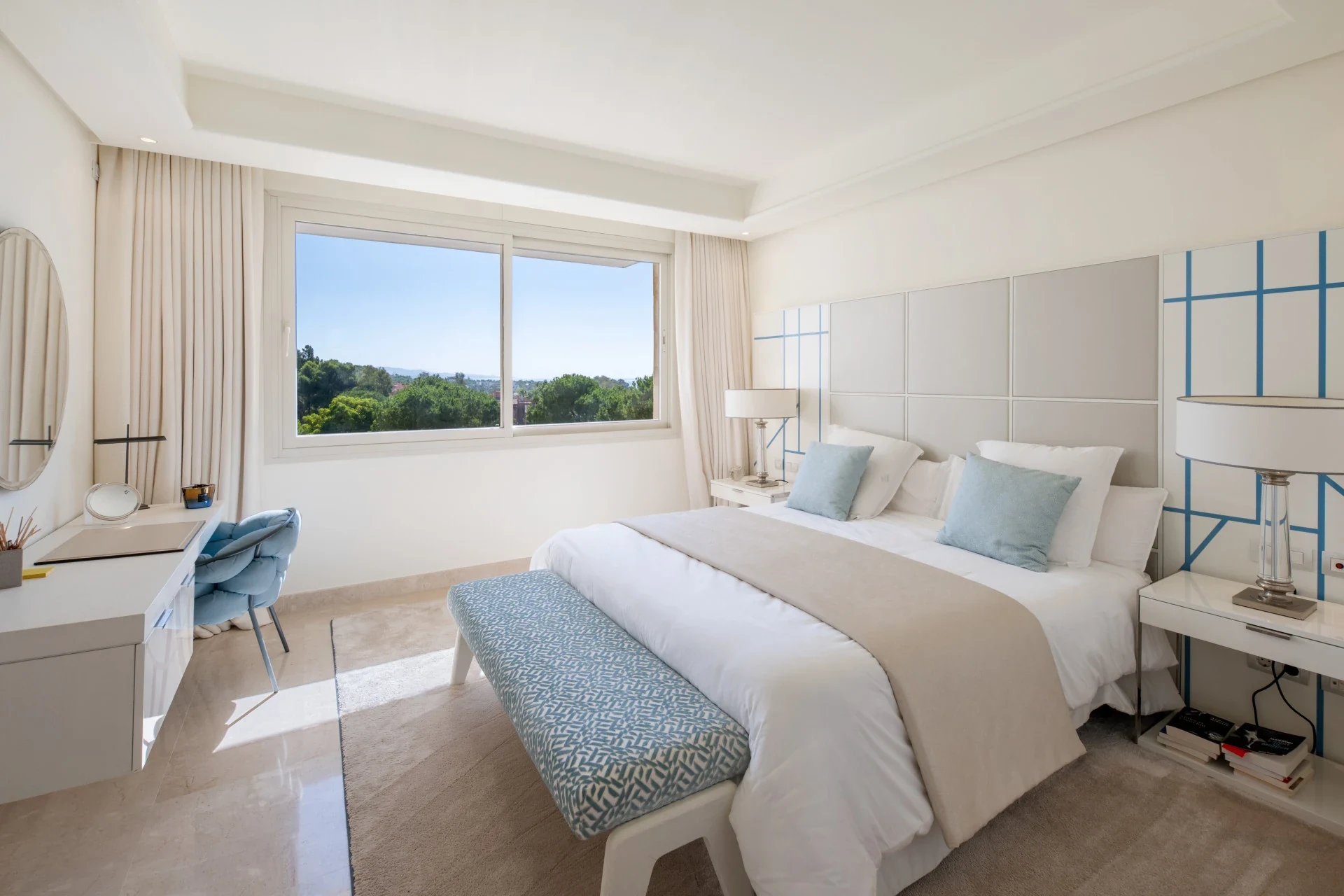 Bedroom with fitted wardrobes and natural light