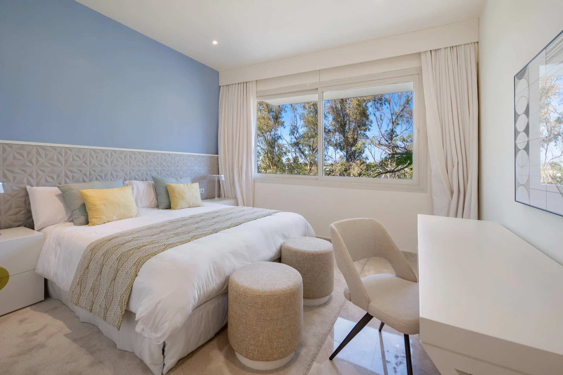 Third bedroom with blue feature wall