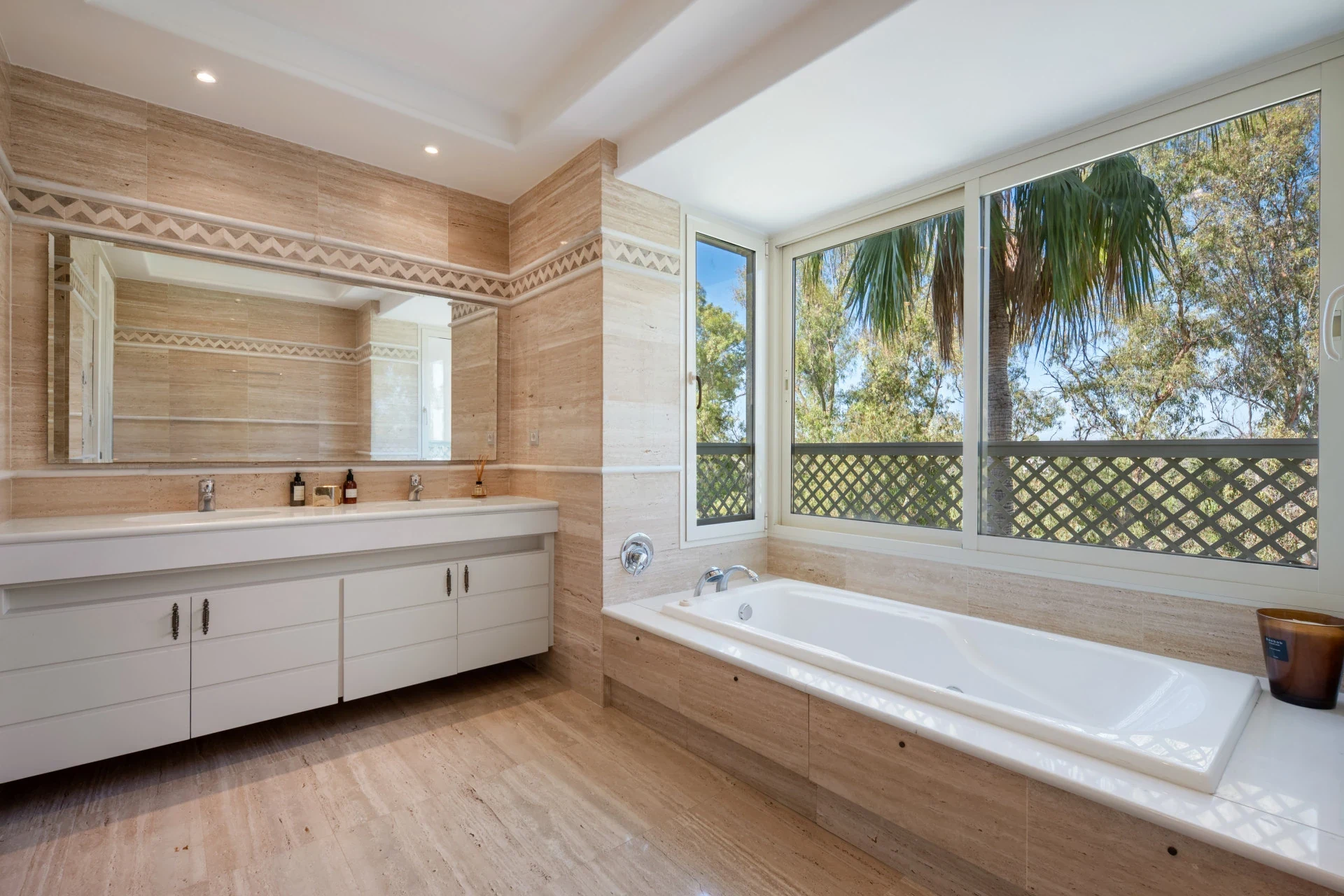 Marble bathroom with bath and double vanity