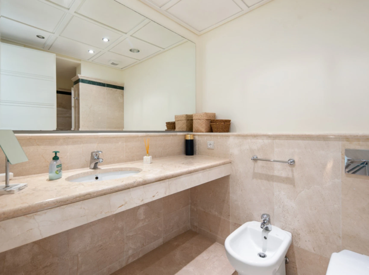 En-suite bathroom with marble finishes