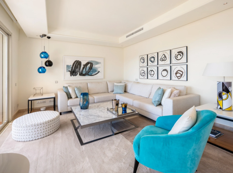 Furnished living room with floor-to-ceiling terrace doors