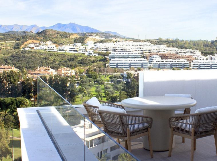 Representative terrace dining area overlooking golf in La Cala de Mijas