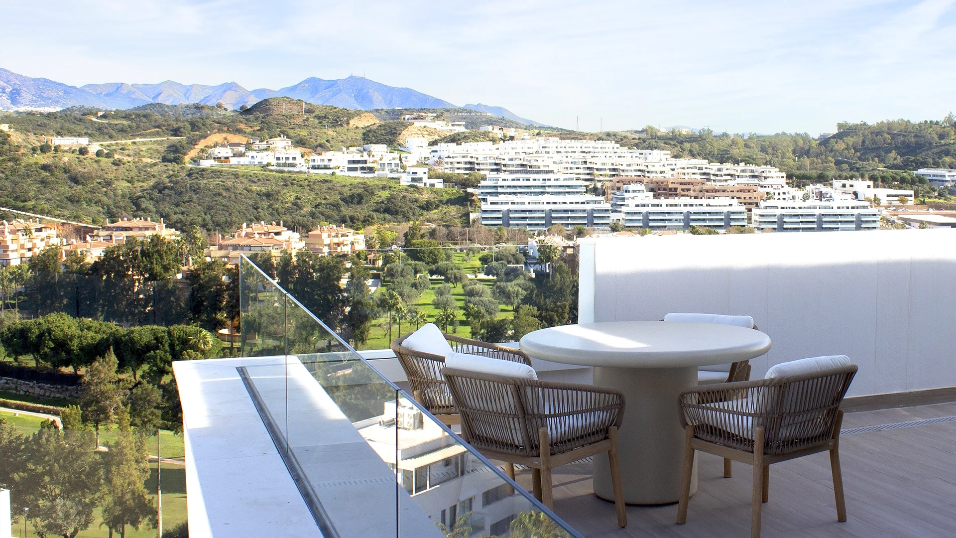 Representative terrace dining area overlooking golf in La Cala de Mijas