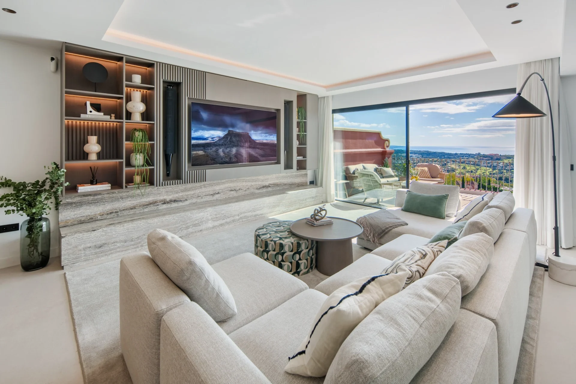 Open-plan living room with terrace access