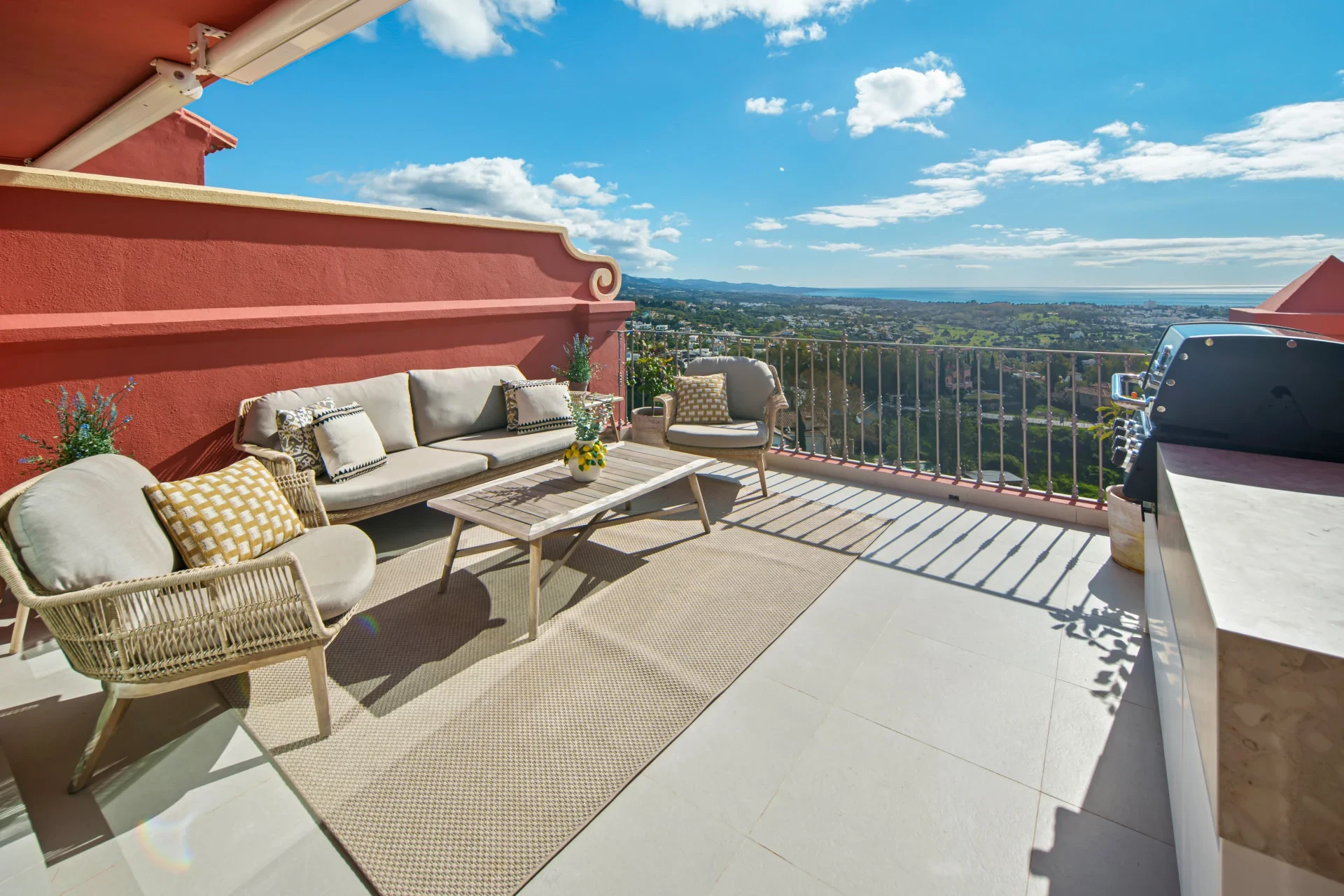 Terrace lounge and outdoor kitchen