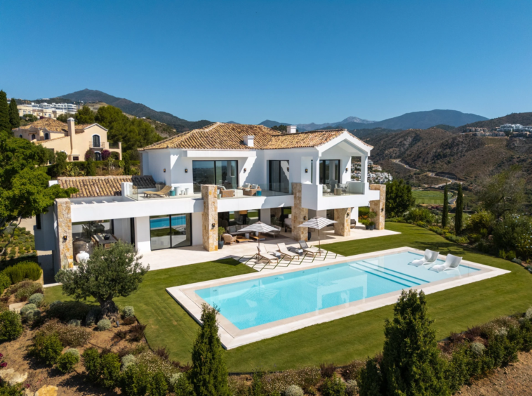 Aerial view of the villa and landscaped garden