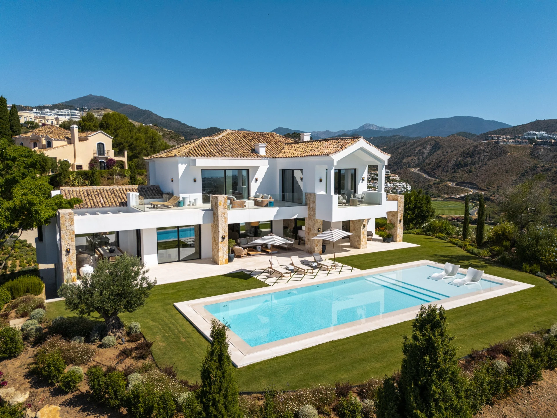 Aerial view of the villa and landscaped garden