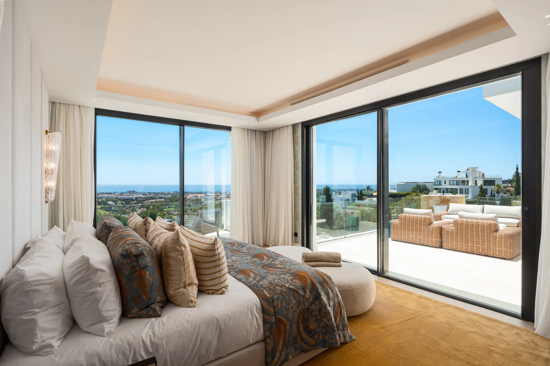 Principal bedroom with sea views and terrace access