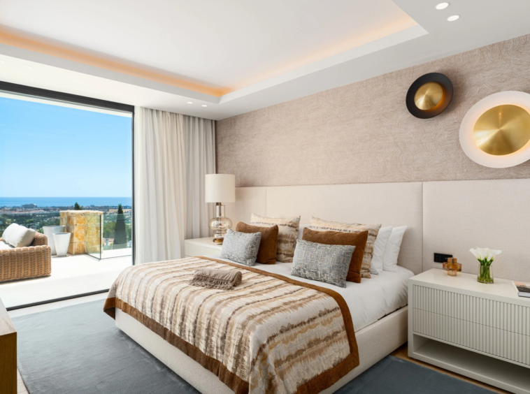 Bedroom with furnished terrace and sea views