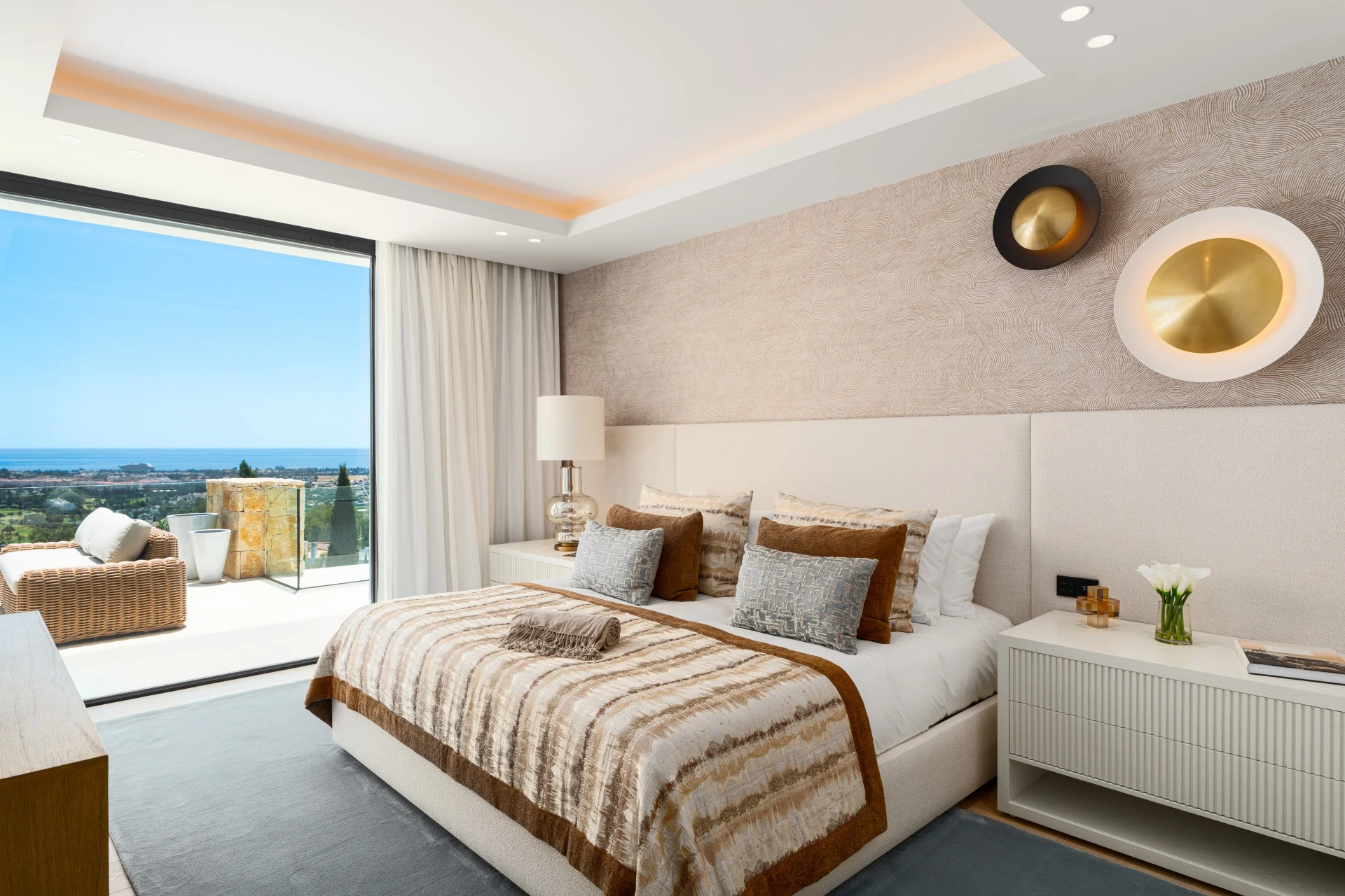 Bedroom with furnished terrace and sea views