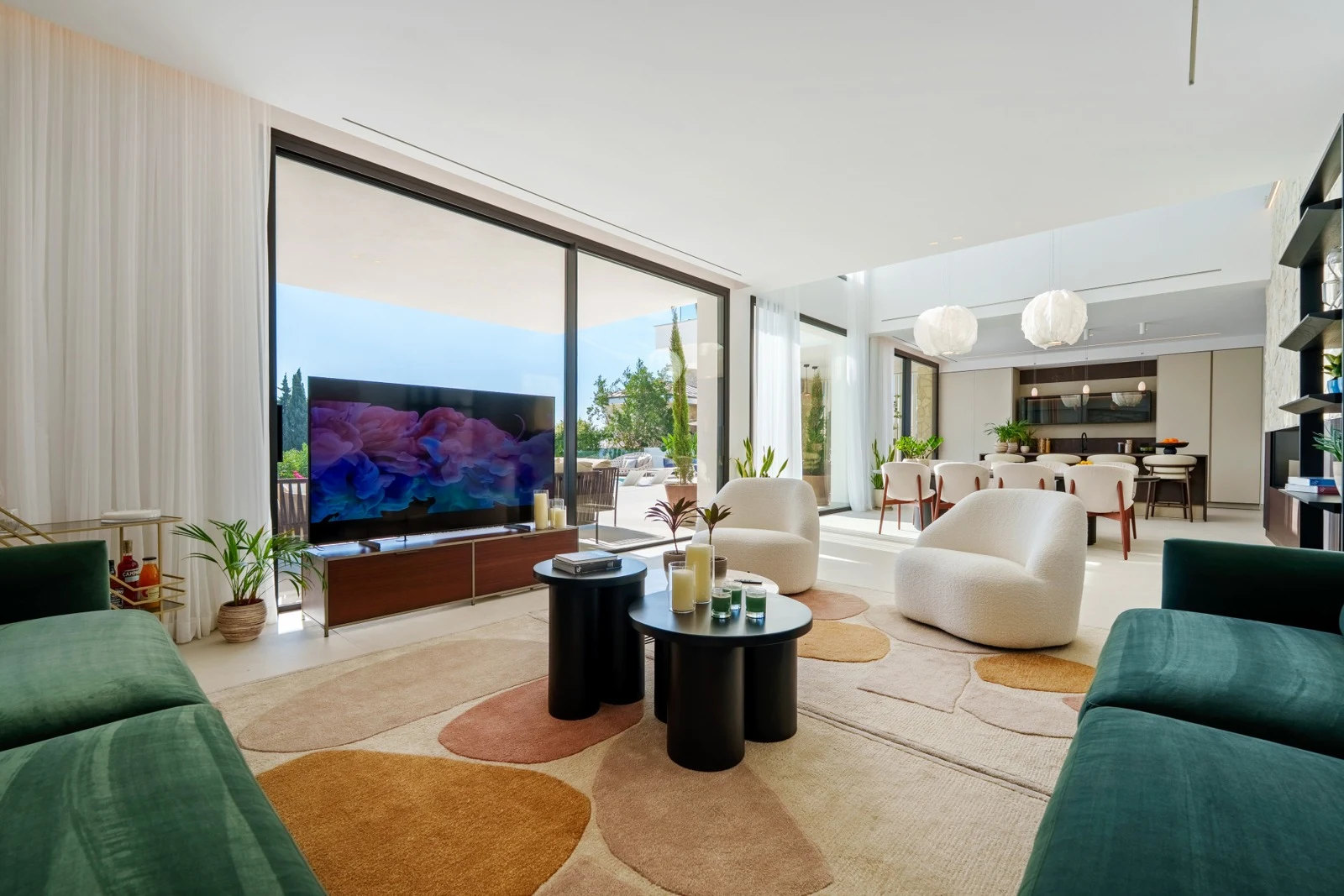 Bright living room opening onto the pool terrace