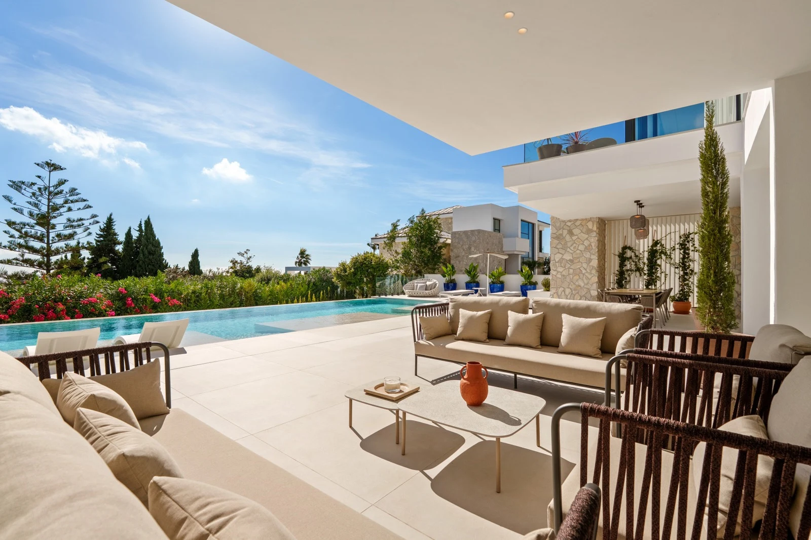 Outdoor lounge beneath the covered terrace