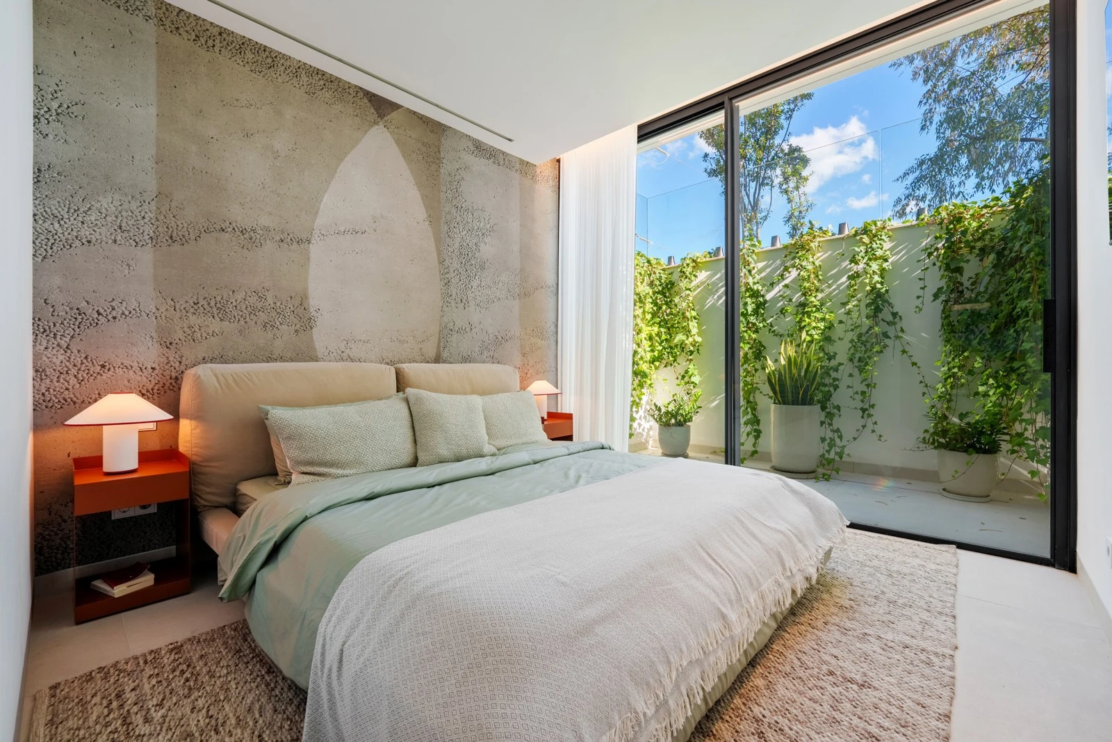 Guest bedroom with a garden outlook