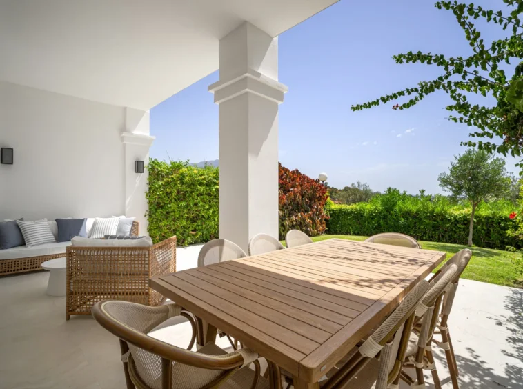 Covered dining terrace beside the garden