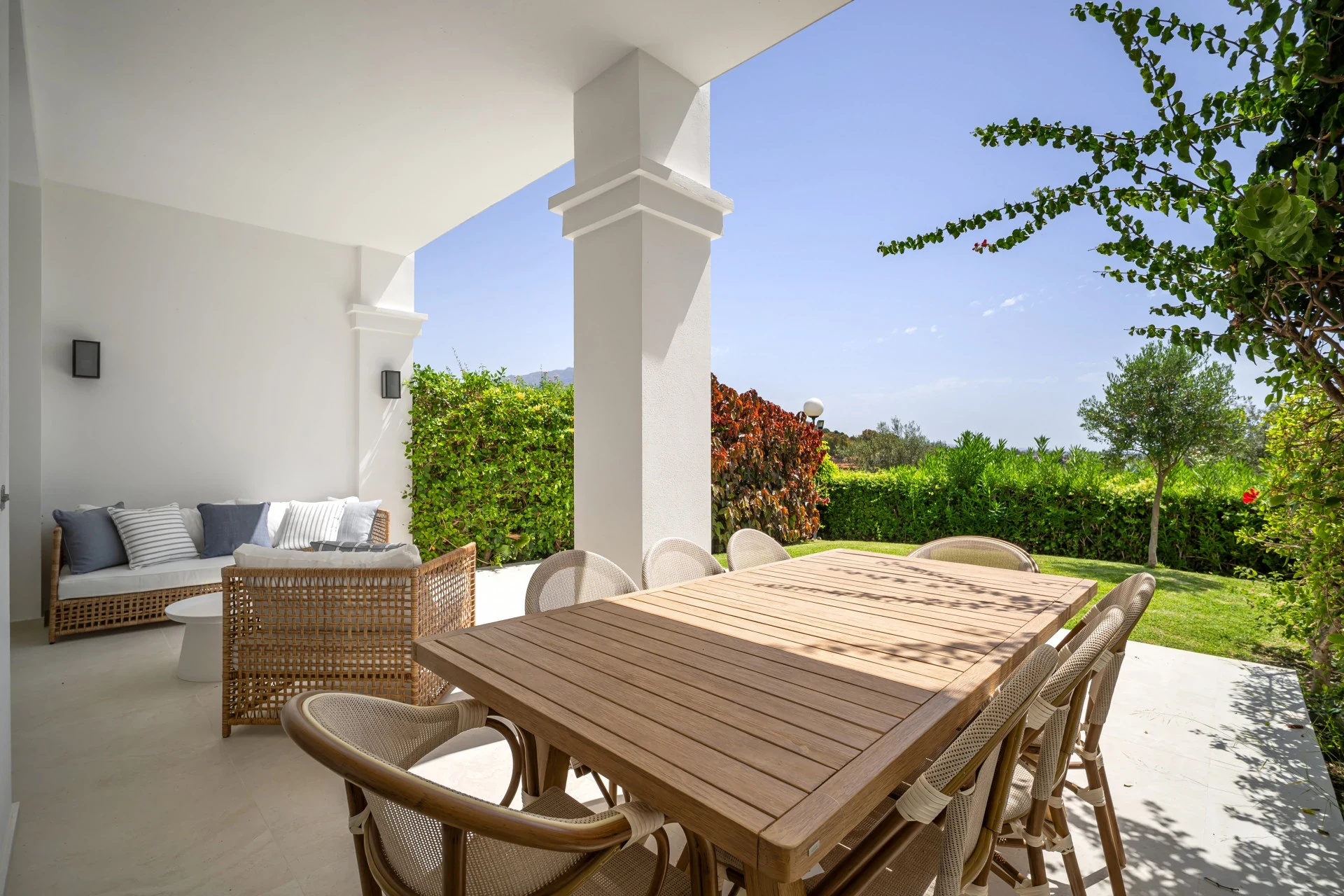 Covered dining terrace beside the garden