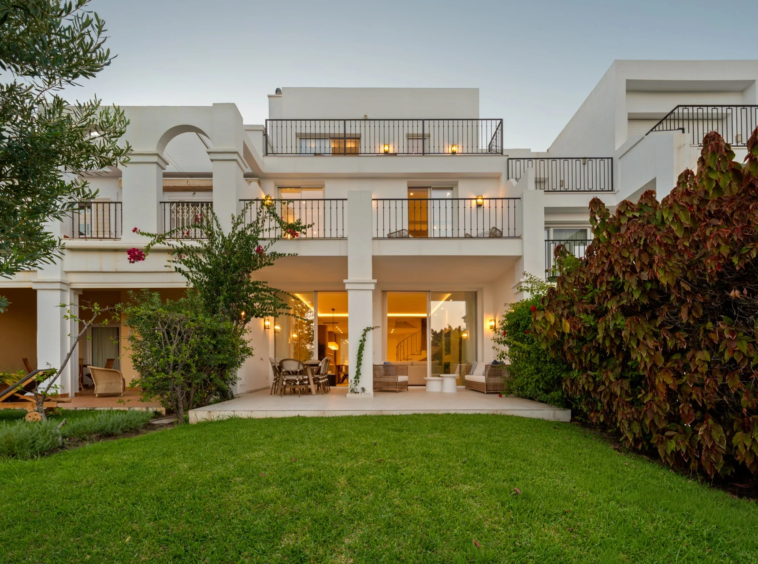 Townhouse and private garden at dusk