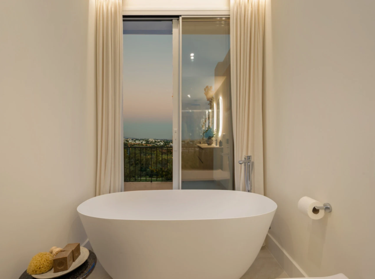 Bathroom with freestanding bath