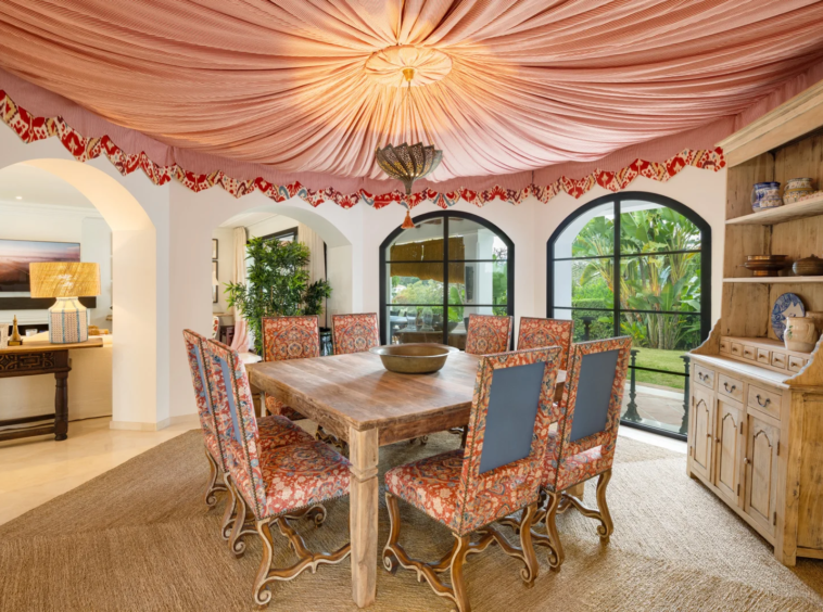 Dining room with an arched doorway