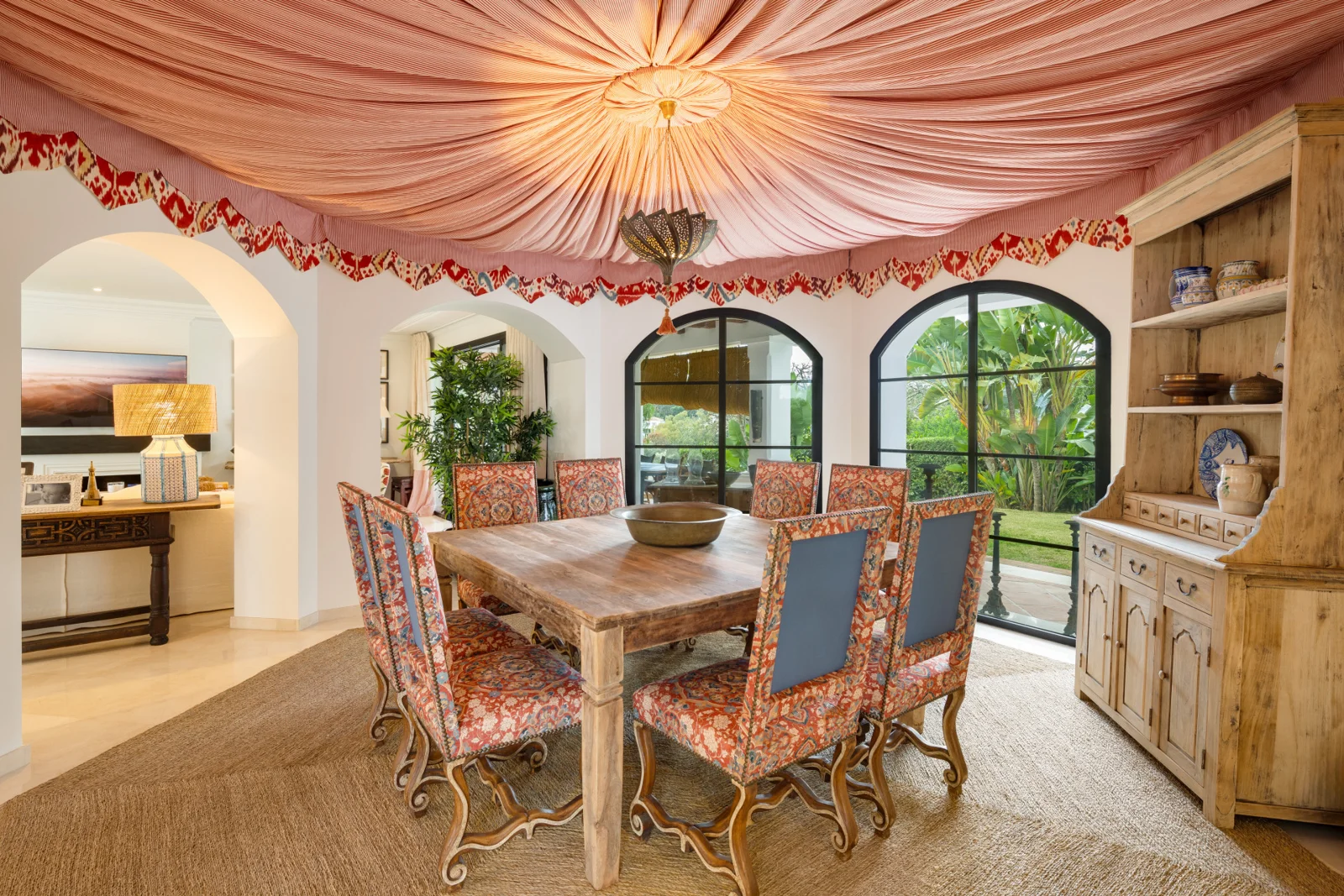 Dining room with an arched doorway