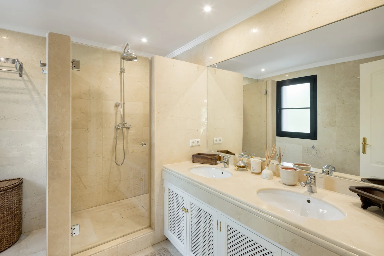 Bathroom with shower and double vanity