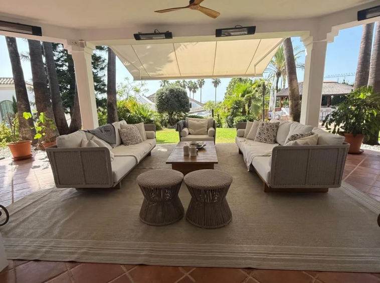 Covered terrace with outdoor seating