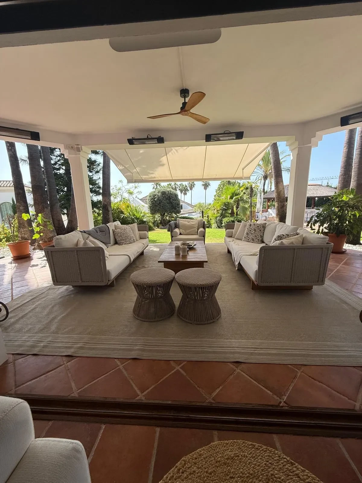 Covered terrace with outdoor seating