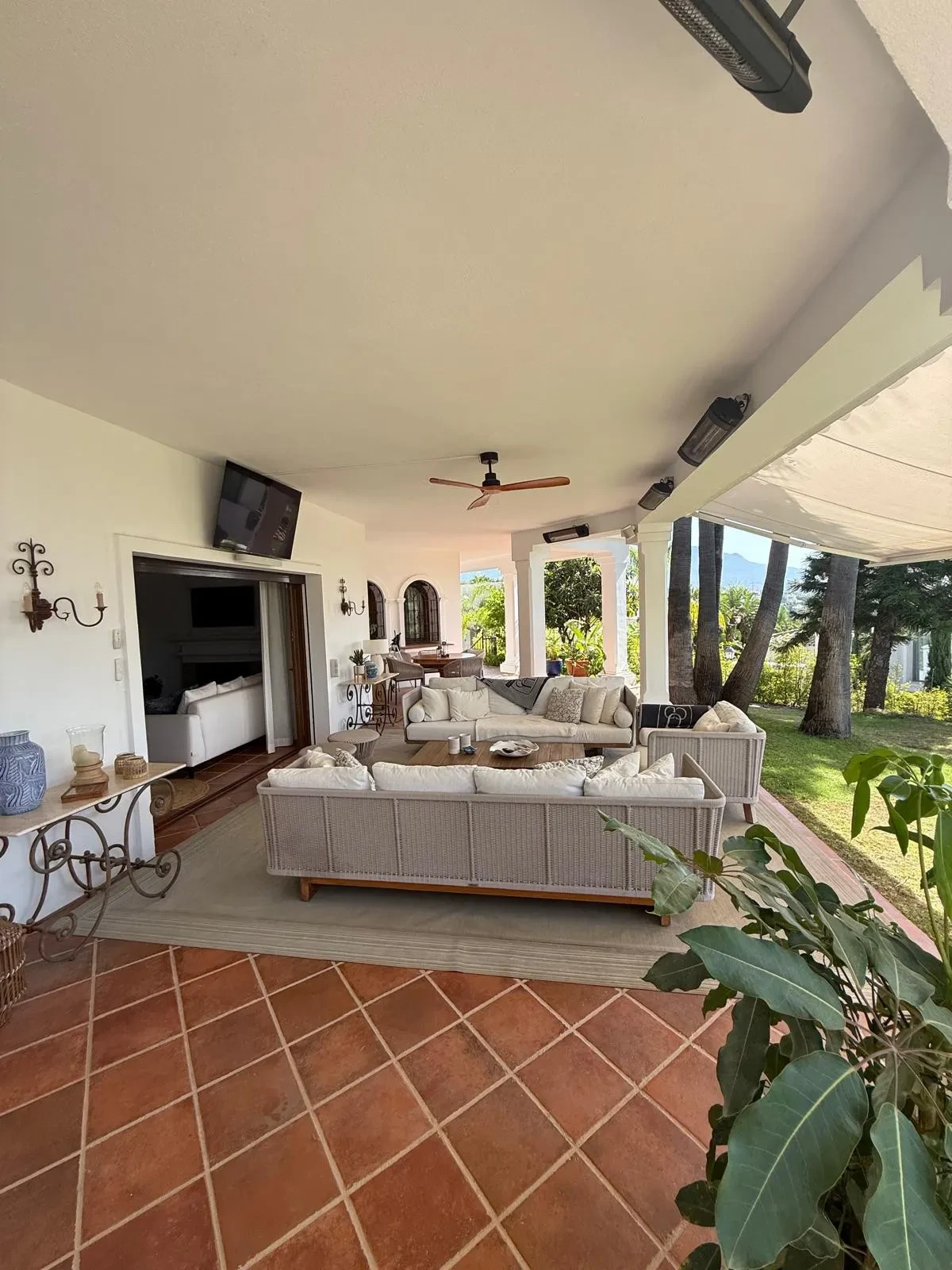 Sheltered outdoor lounge overlooking the garden
