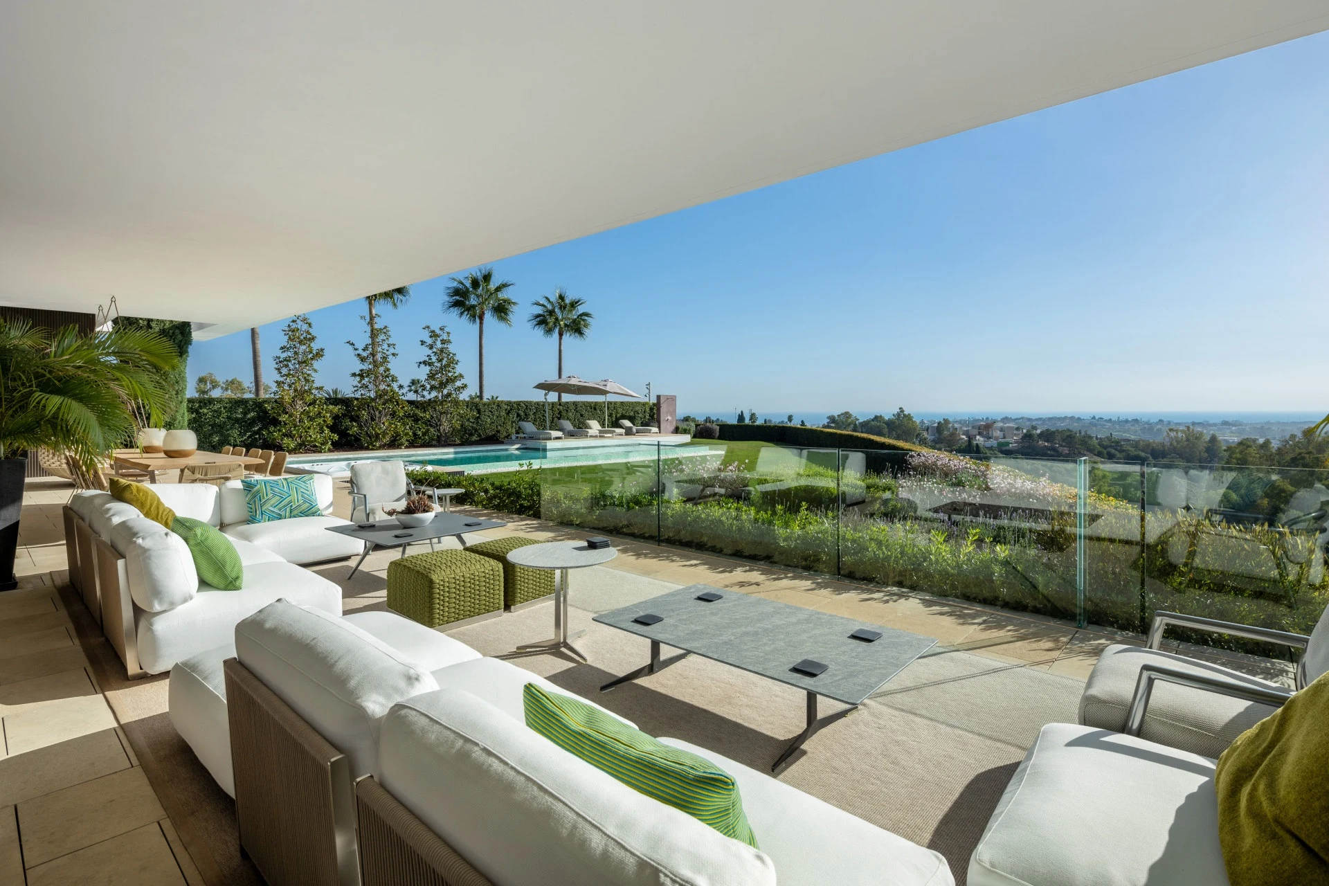 Covered terrace lounge overlooking the coast in La Quinta