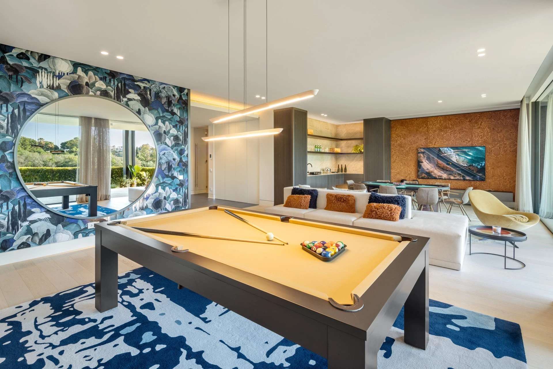 Games room with billiard table and seating