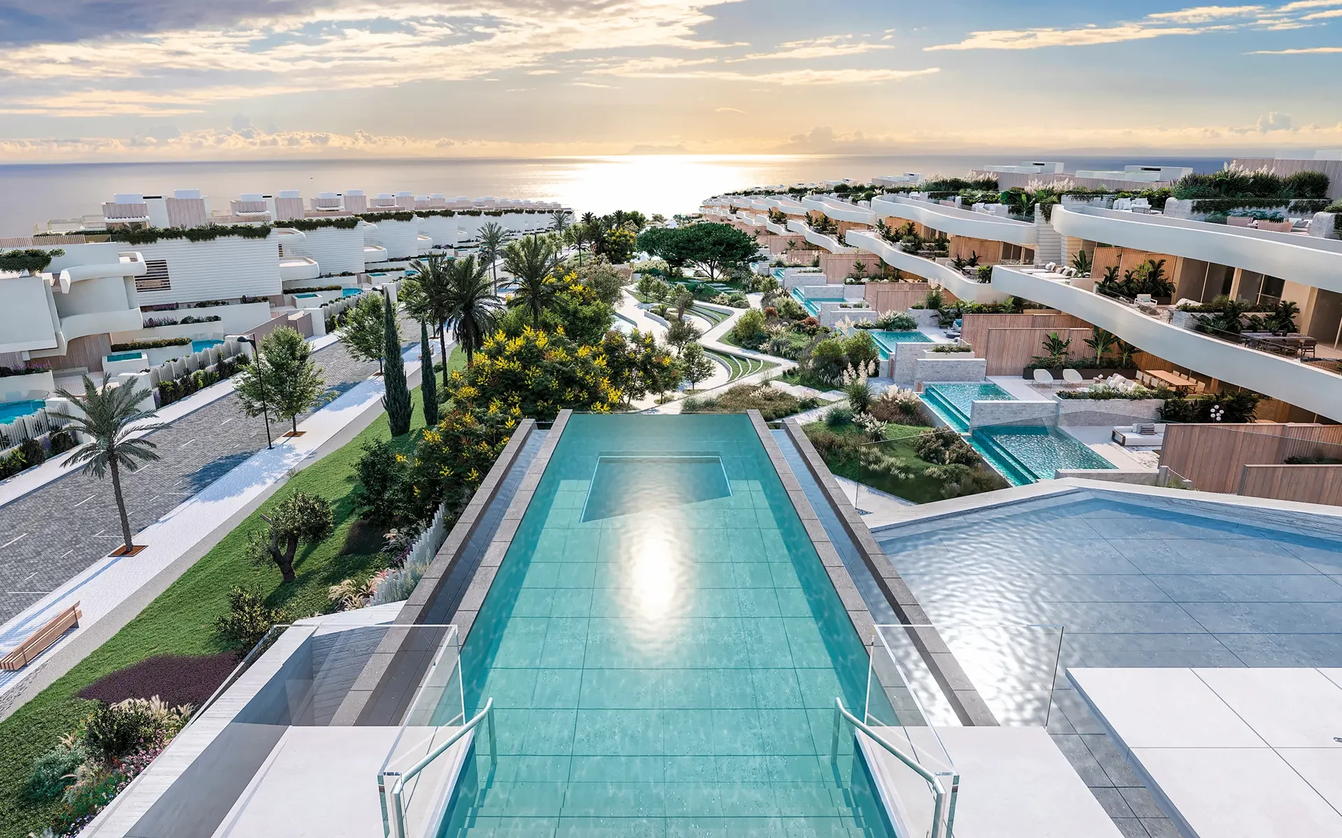 Shared rooftop pool with views across the coastal community