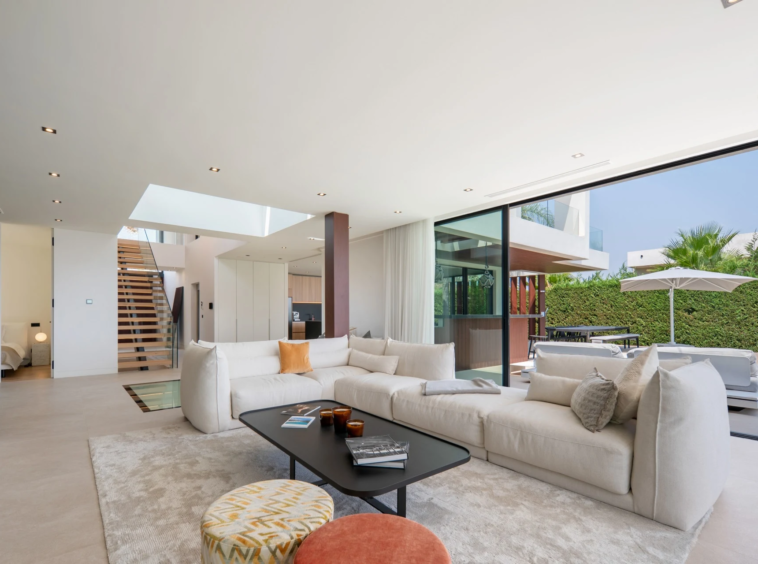Open living area with staircase and access to the garden