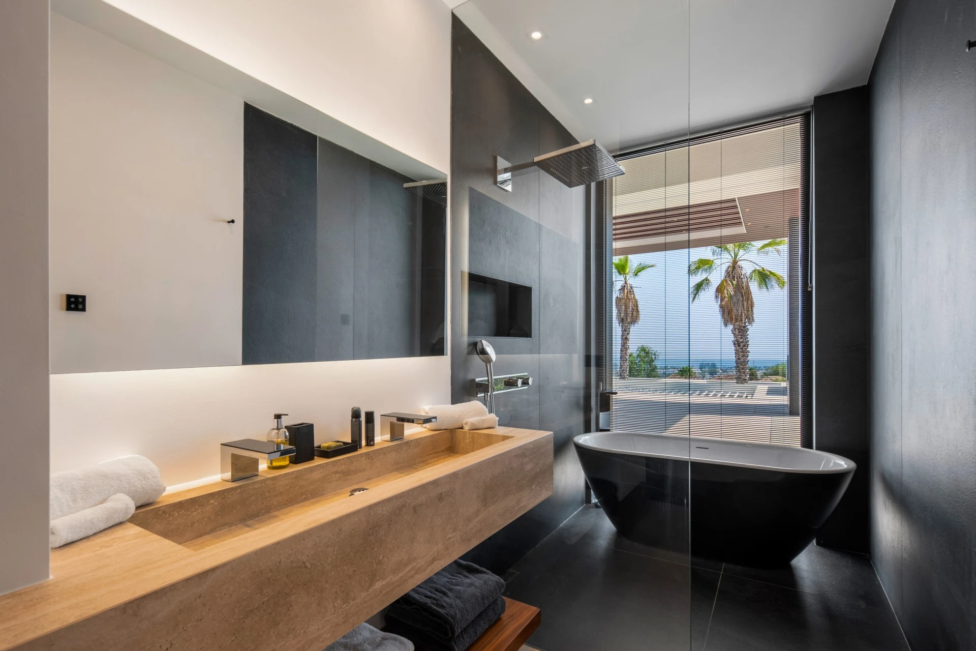 Bathroom with freestanding bath and twin-basin vanity