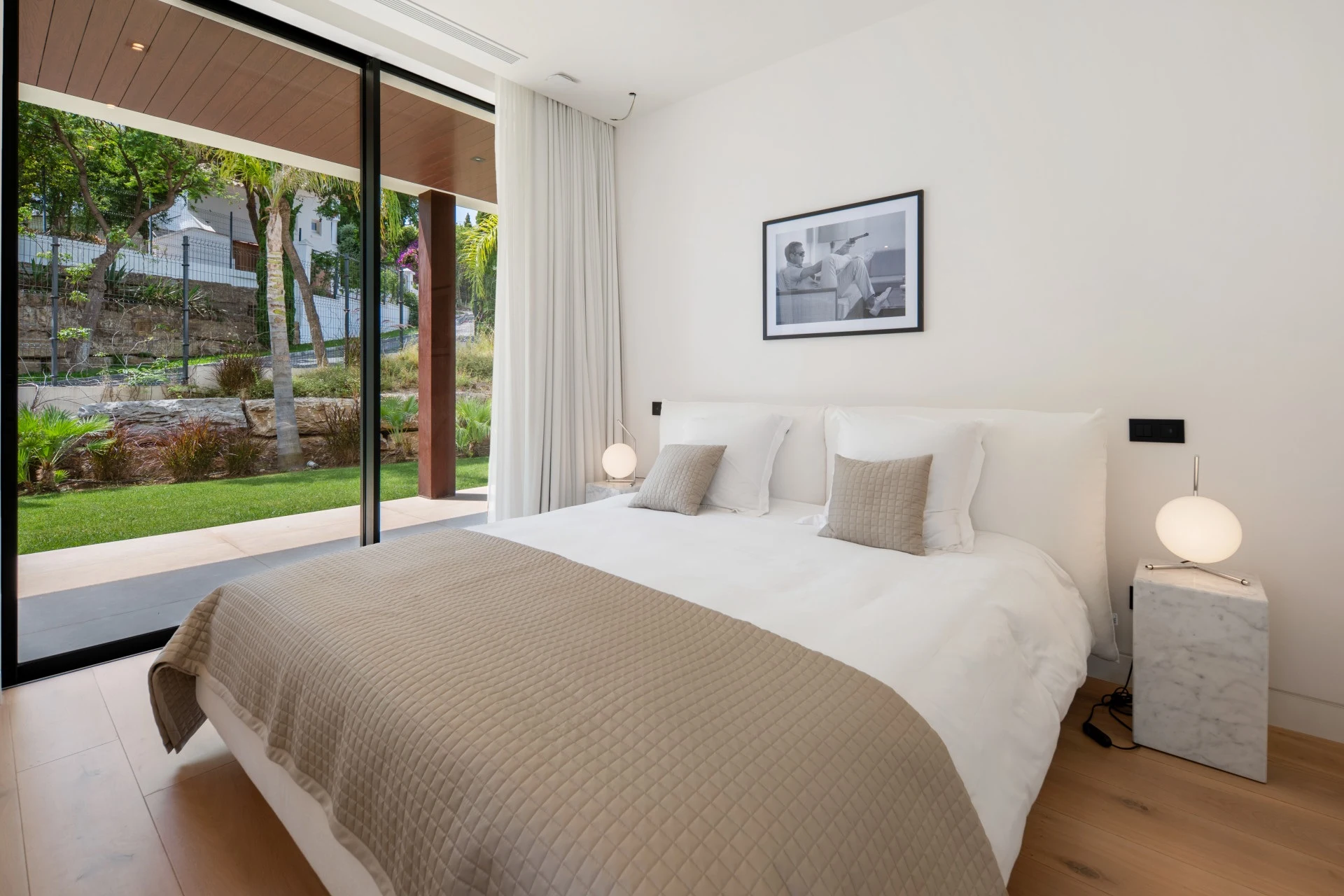 Guest bedroom overlooking the planted garden