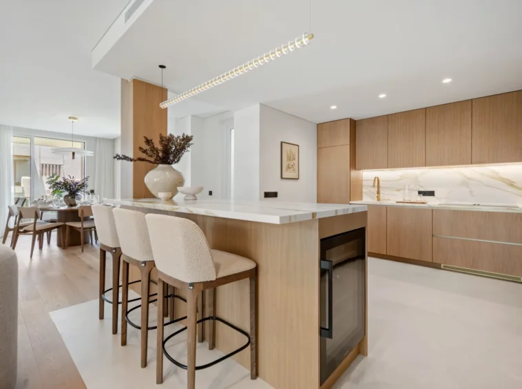 Kitchen with oak cabinetry and island