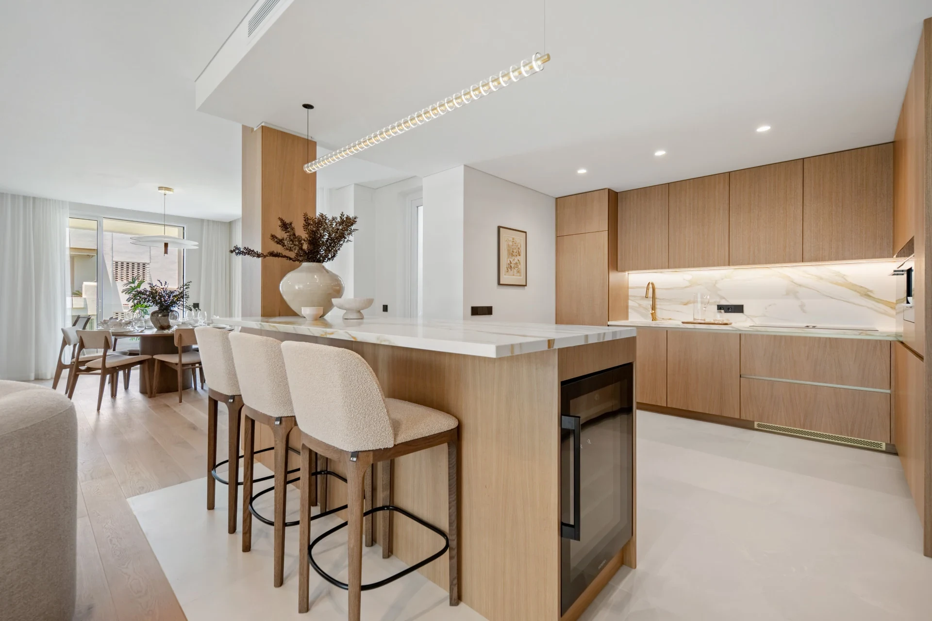 Kitchen with oak cabinetry and island