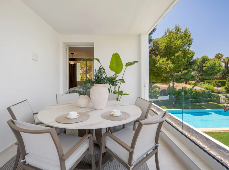 Dining terrace overlooking the communal pool