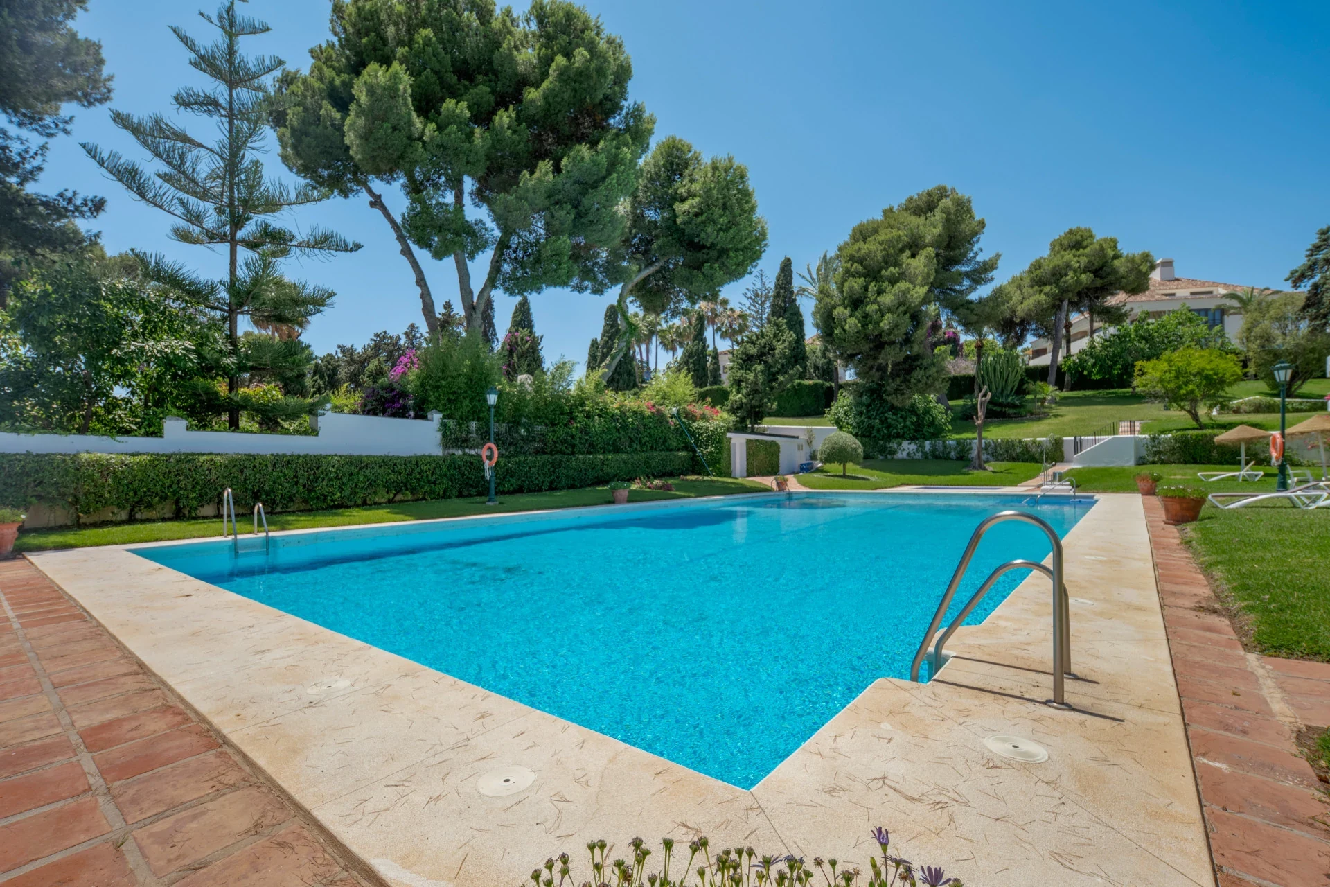 Shared swimming pool and landscaped gardens