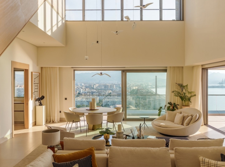 Representative double-height penthouse living room