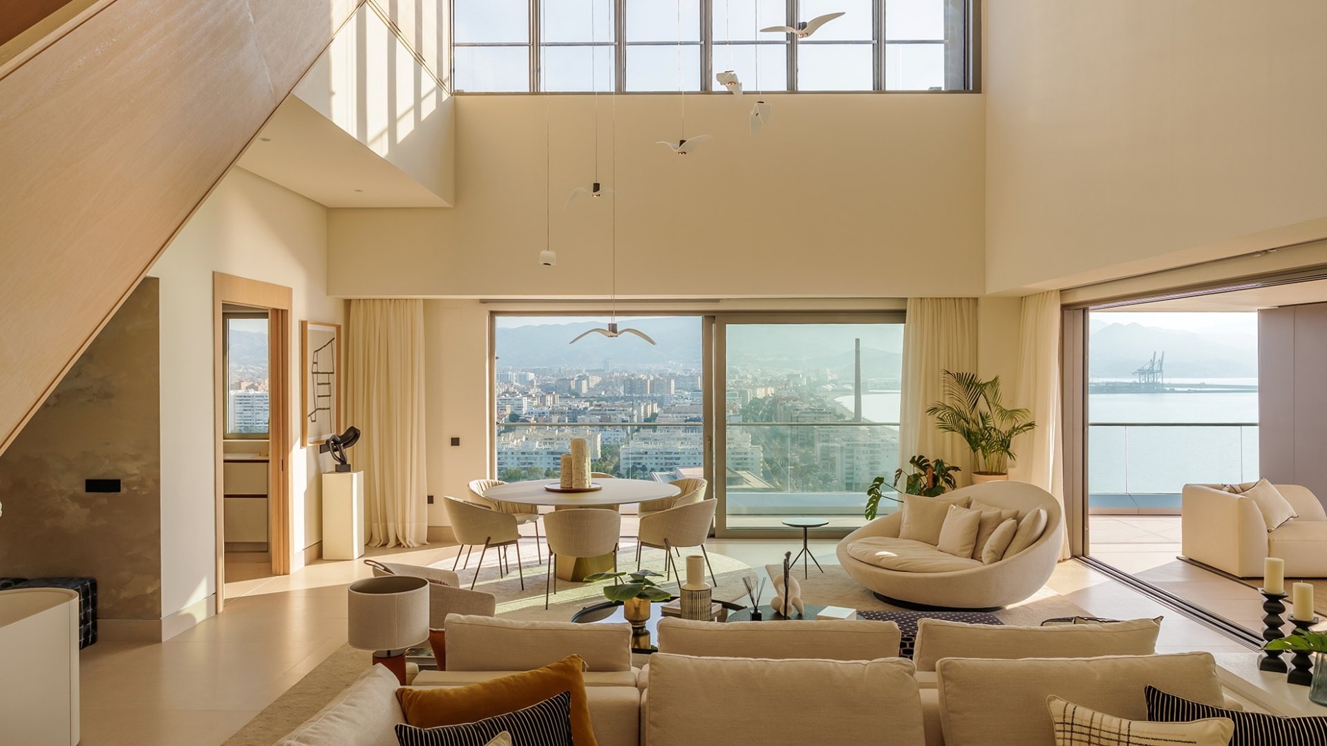Representative double-height penthouse living room