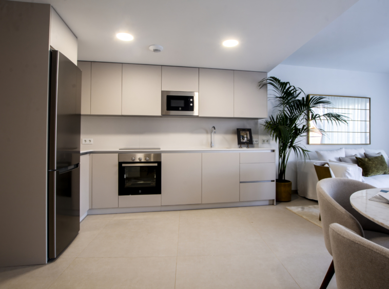 Fitted kitchen and living room in the representative show home