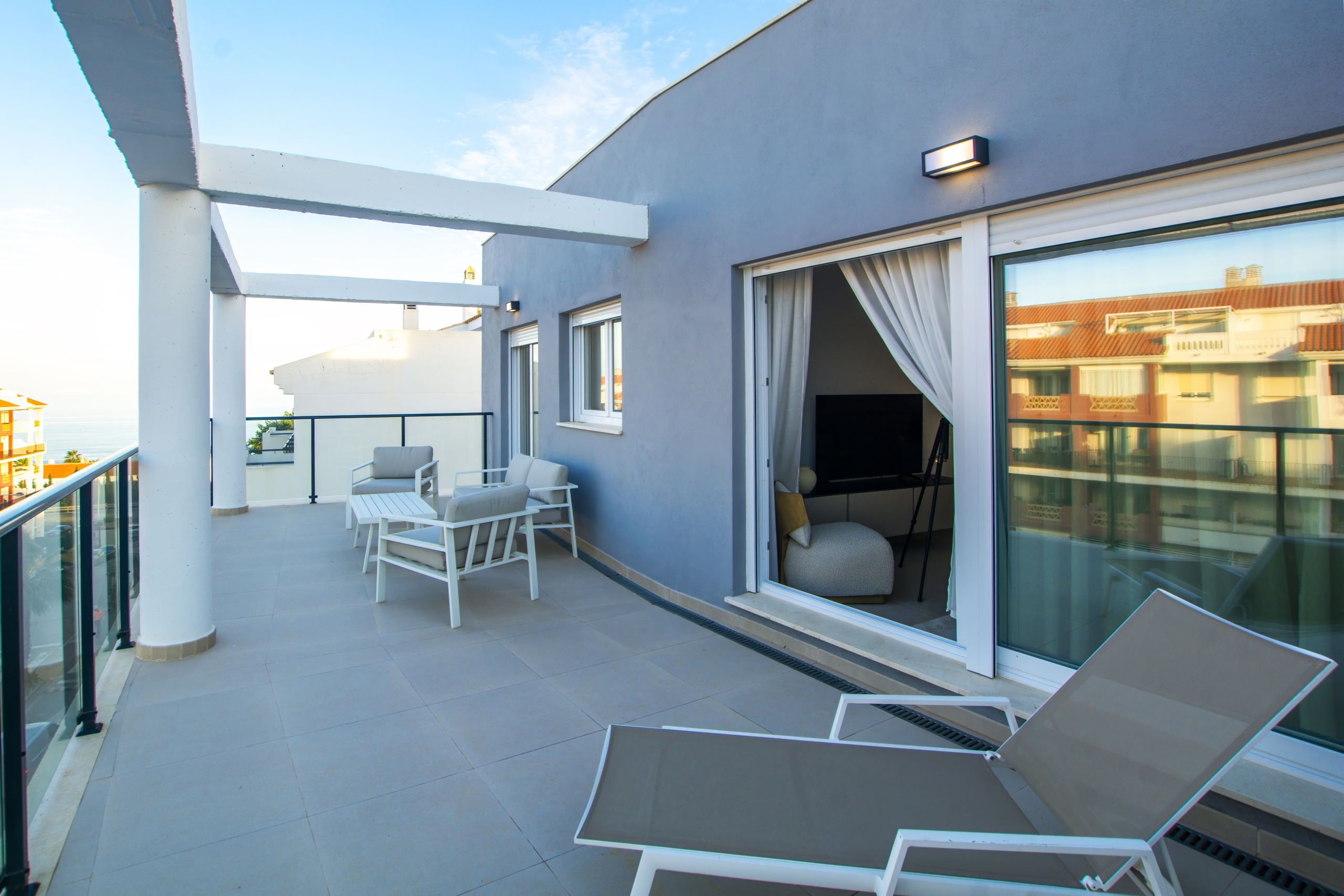 Representative show-home terrace with outdoor seating