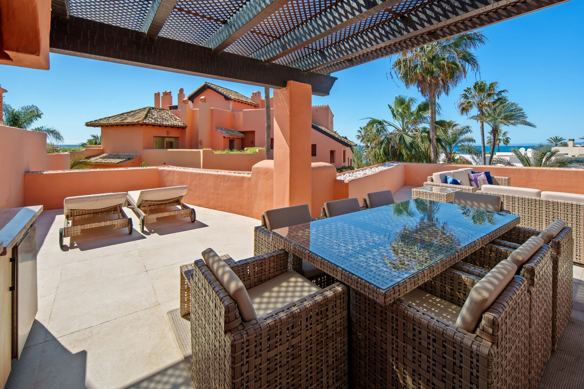 Covered outdoor dining area on the private terrace